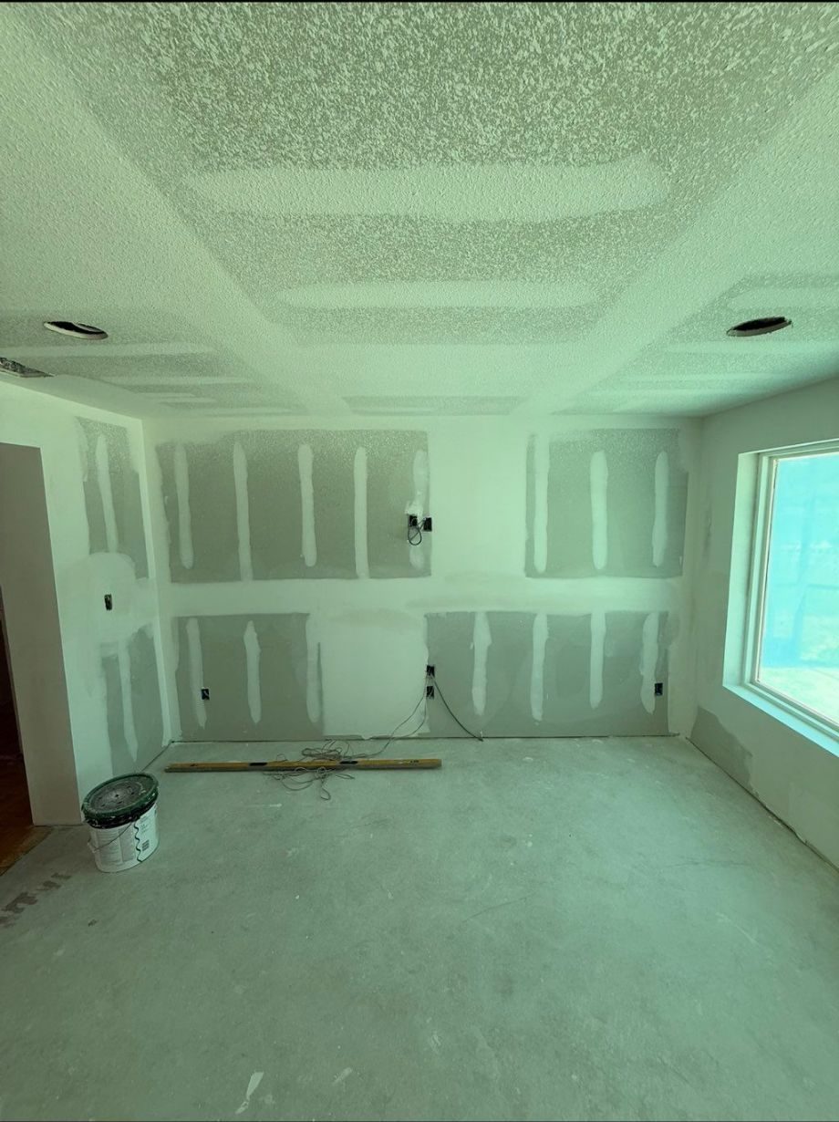 Room with fresh drywall ready for paint