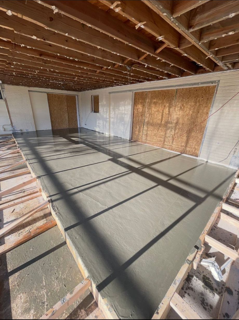 Freshly poured concrete slab on a home addition